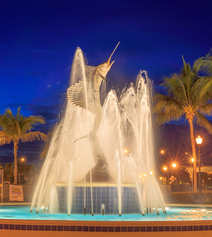 The iconic Sailfish water fountain in Stuart FL, symbolizing the charm and appeal of waterfront living in Stuart